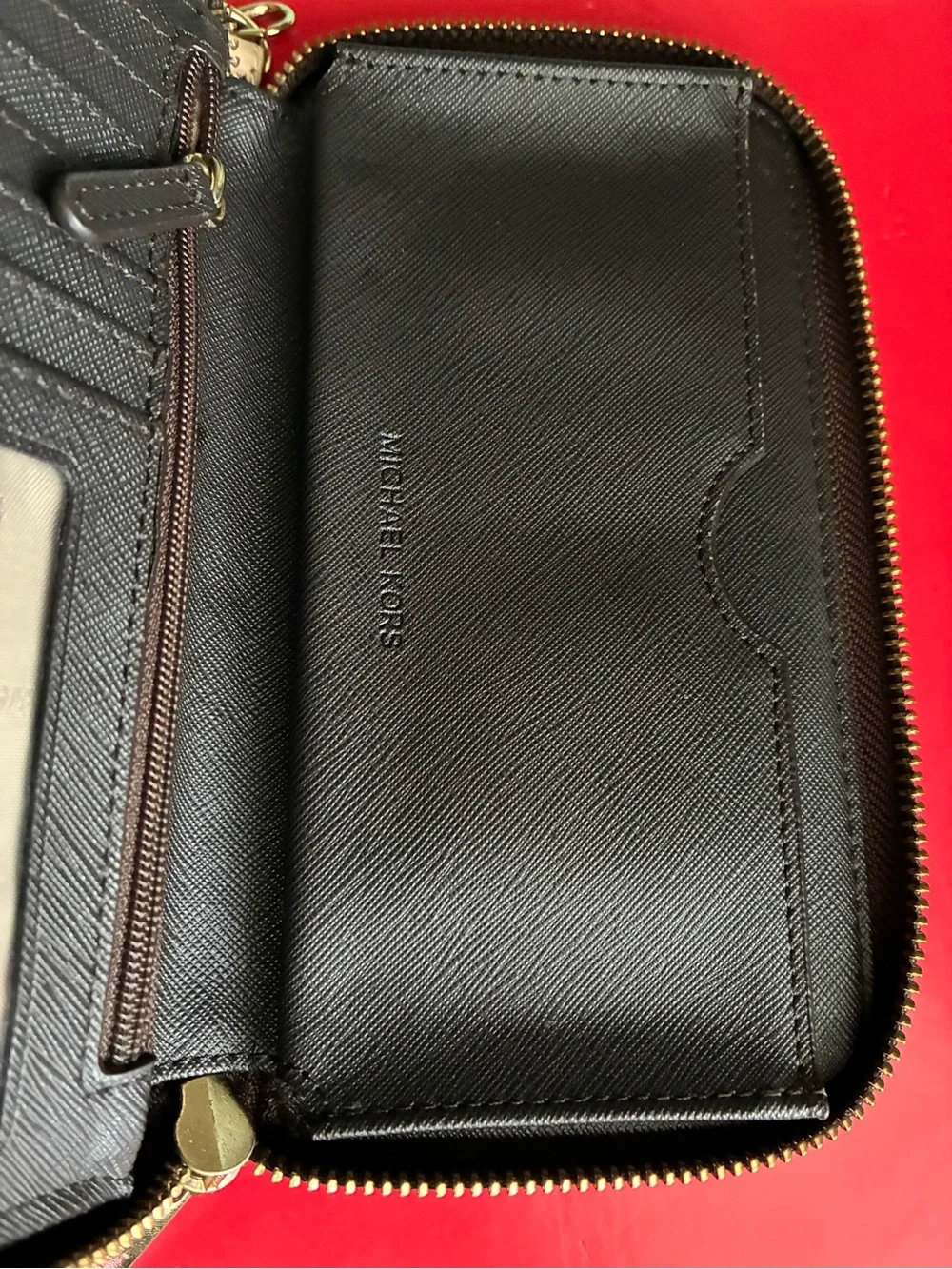 Michael Kors Black and Gold Logo Wristlet